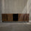 CÓMODA ZIZU 4 PUERTAS Y ENTREPAÑOS LEÑA